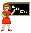 teacher in front of chalkboard